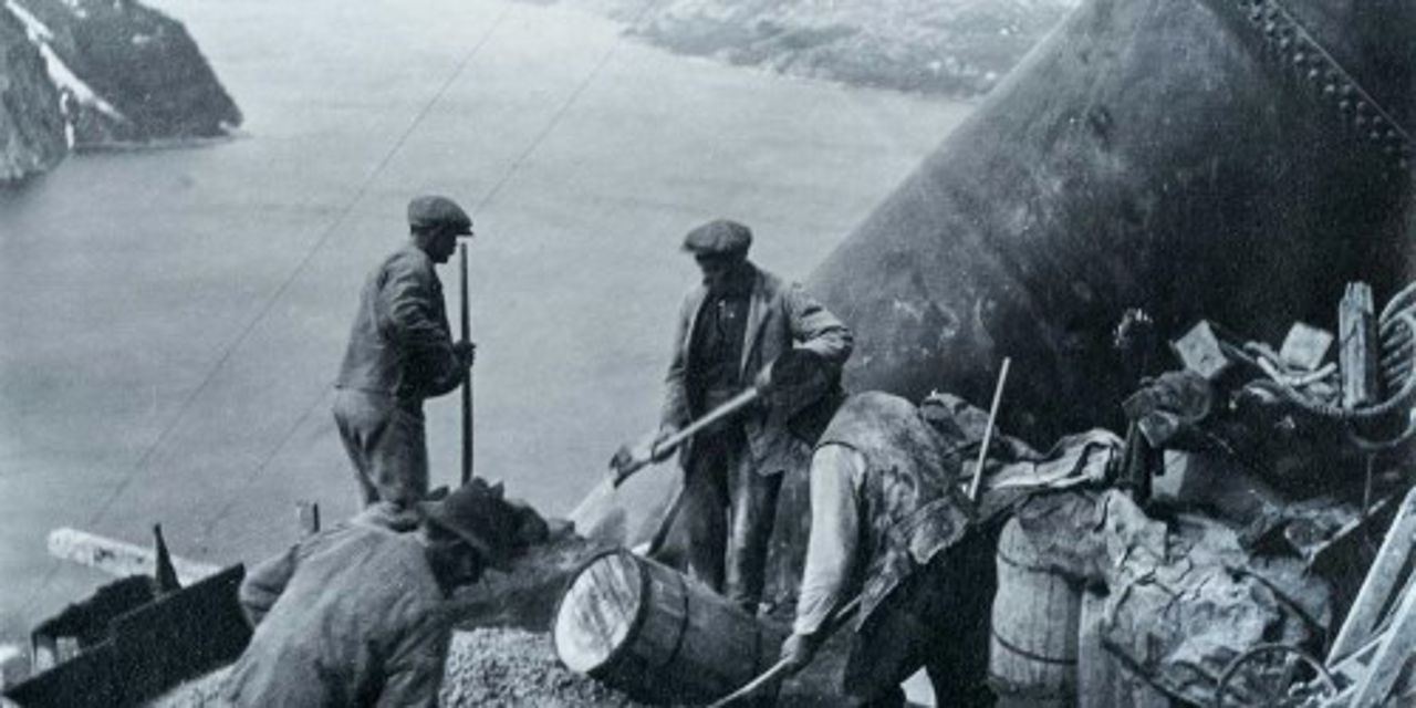 Men building hydropower plant